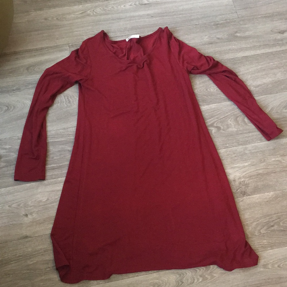 Gently used mini long sleeved dress size large.